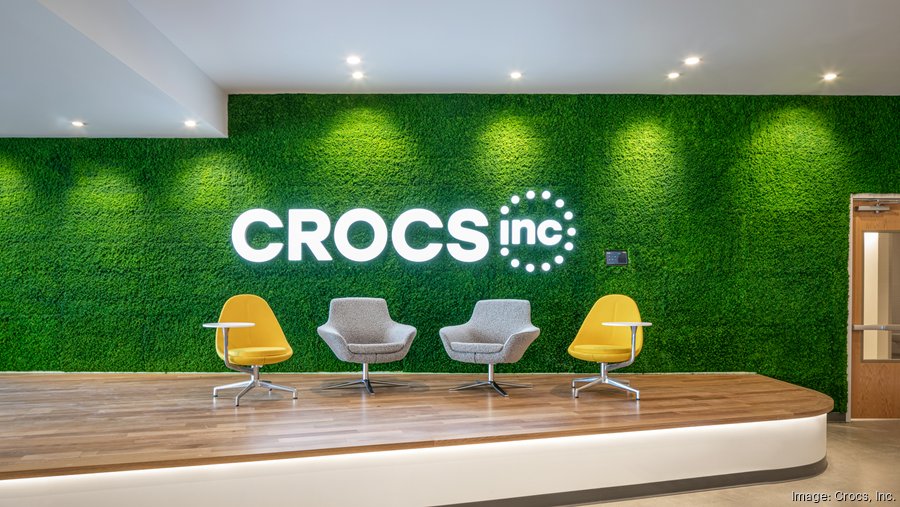 Crocs Inc corporate office reception area with illuminated logo